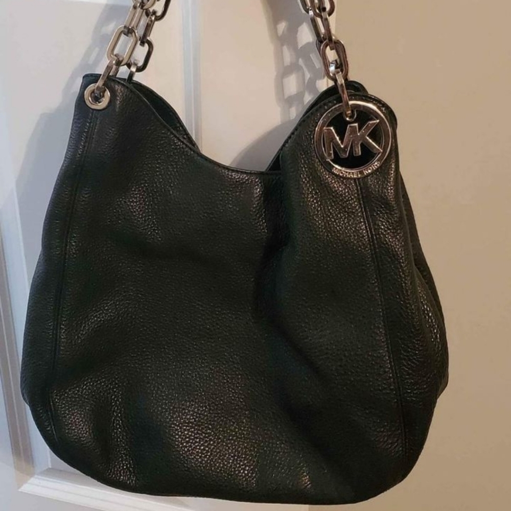 Michael Kors pocketbook and matching wallet.